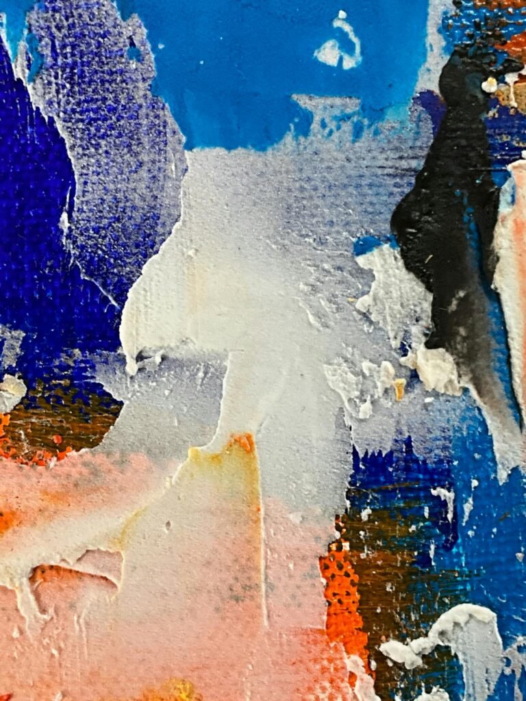 Colorful close-up of abstract acrylic painting with vivid texture and modern art style.